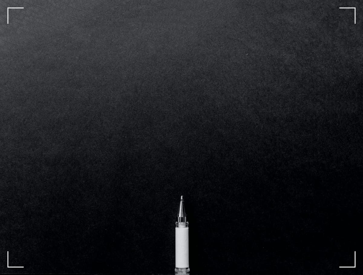 A pencil on a black background.