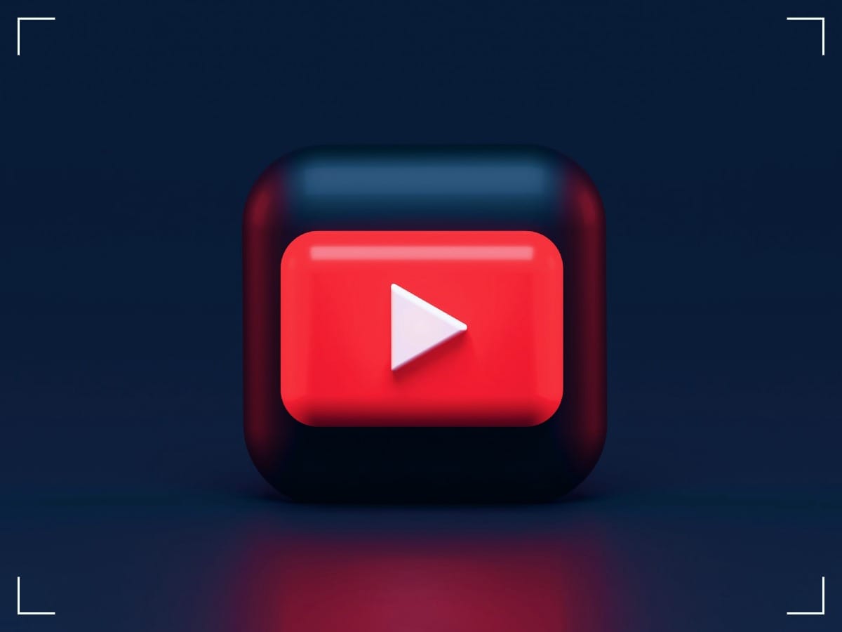 YouTube logo on a purple-blue background.